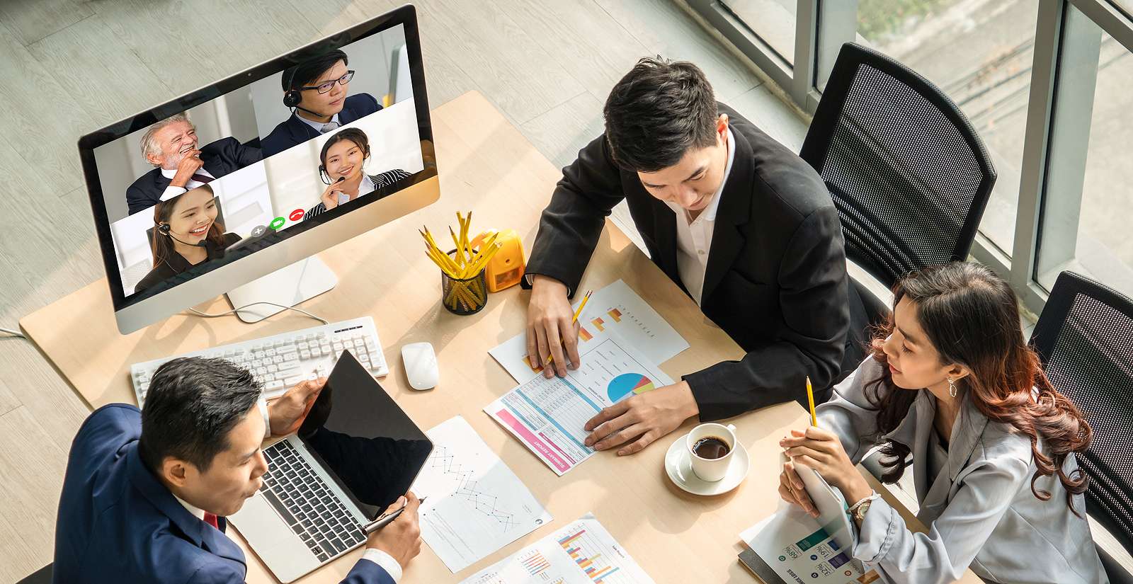 Video call group business people meeting on virtual workplace or remote office. Telework conference call using smart video technology to communicate colleague in professional corporate business.